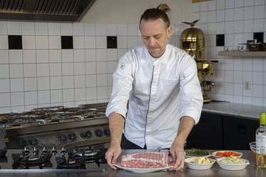 Take the veal roulade out of the fridge
