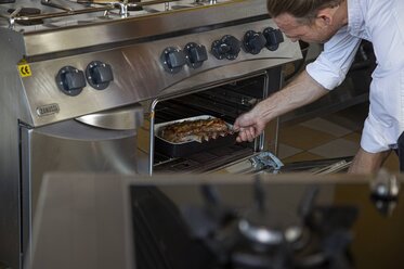 Remove the dish out of the oven