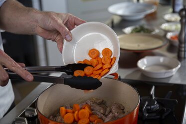 Add the vegetables and herbs to the casserole dish