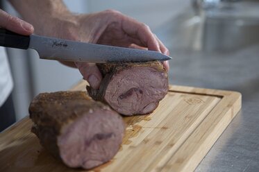 Slice the veal blade into 2.5cm slices