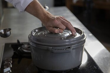 Place the casserole dish on a low heat with the lid on