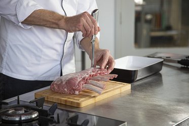Using a thin, sharp knife, cut slits into the meat about 3cm deep