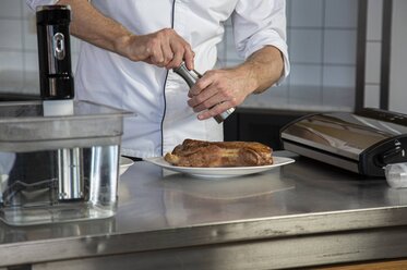 Season the veal with herbs and spices