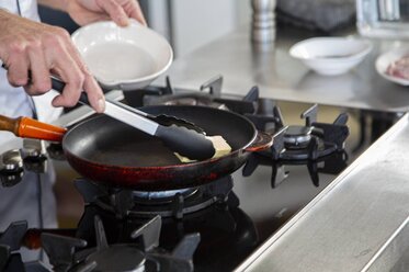 Put the butter into the frying pan