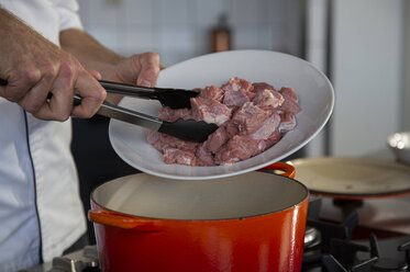 Put the veal into the casserole dish