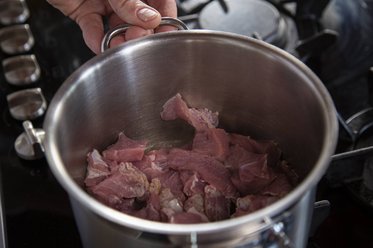 Fry the diced veal