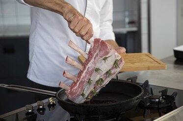 Place the frenched rack of veal into the casserole dish