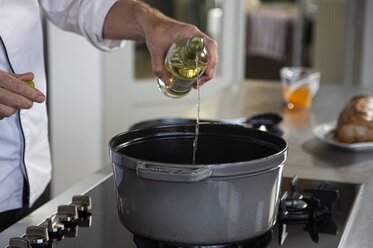 Add wine to the veal